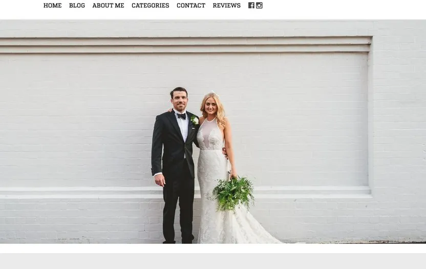Nick Evans Photography, a couple photographed against a white brick wall on the 2014 homepage